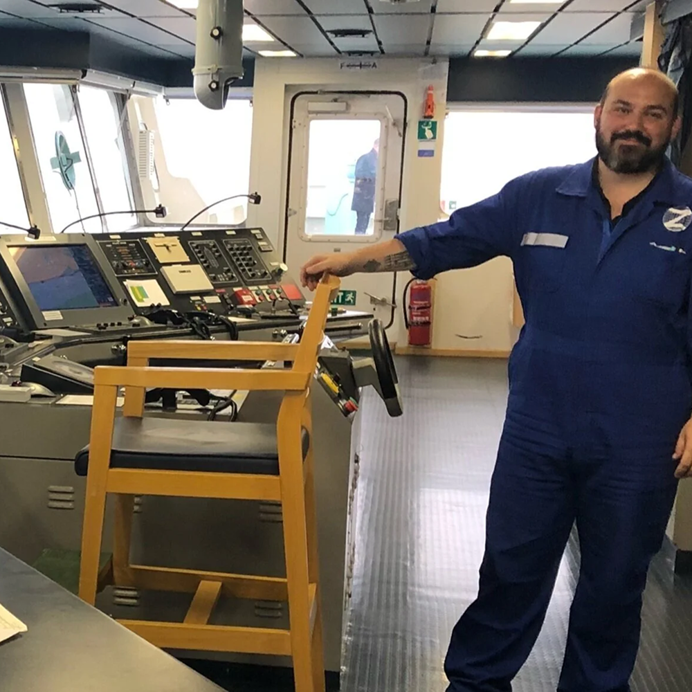 An officer at the bridge console during onboard research